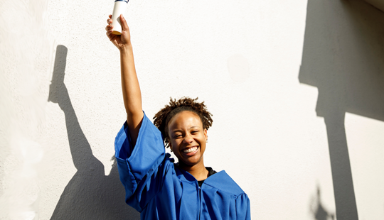 graduate woman smiling